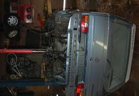 Rear suspension removed for reconditioning.
