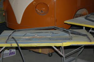 Passenger door window frame.